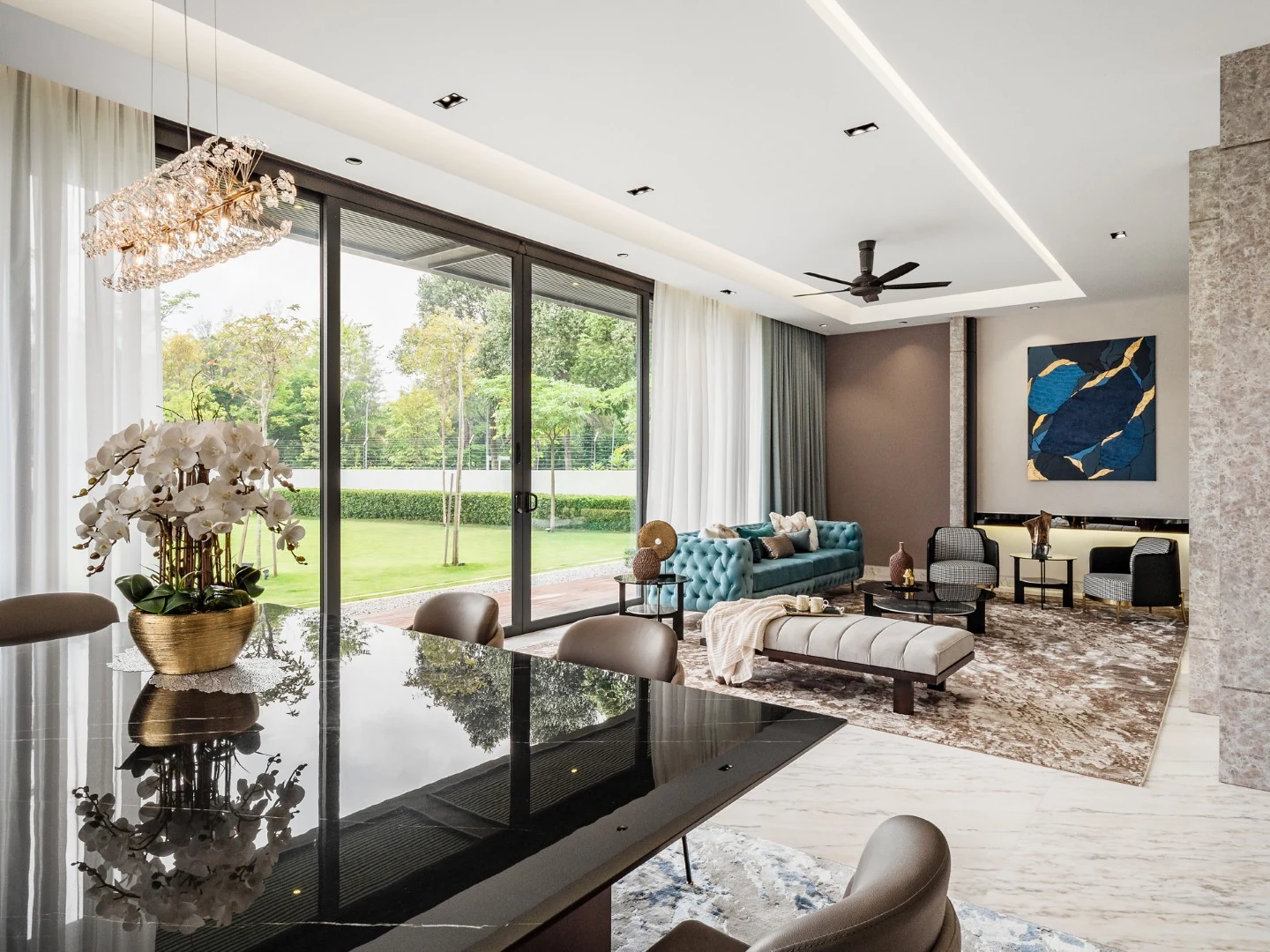 Modern dining table in black stone looking across the living hall to the garden, Kelana Jaya bungalow, Selangor, Malaysia, by Blaine Robert Design