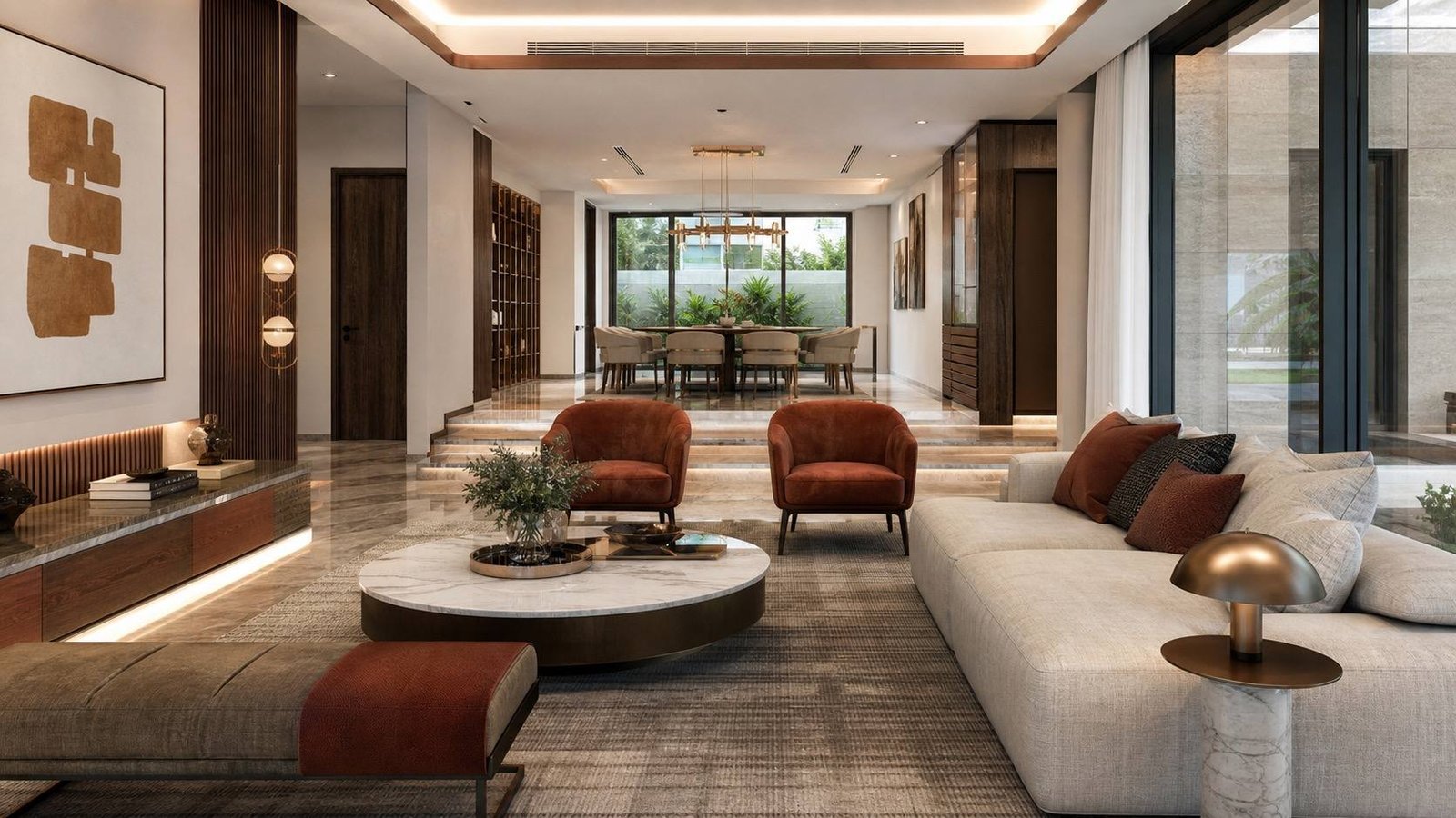 Villa living room with a long sofa, two rust armchairs and a marble coffee table, stepping up to the dining room and garden, District One Mansion, Dubai, by Blaine Robert Design