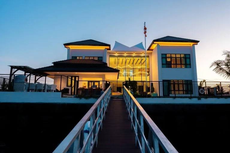 Quayside Villa at dusk, viewed from the jetty, Port Dickson, Malaysia